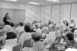 Photograph of Starr Olsen teaching a group of seniors