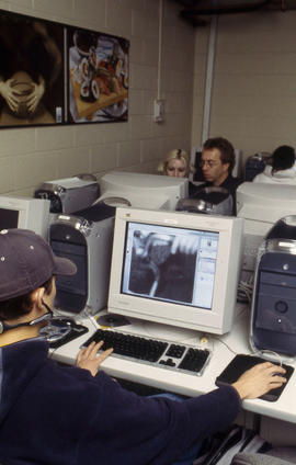 Photograph of students in the journalism lab