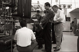 Photograph of a group tour in a refrigeration lab