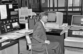 Photograp of Allan Hewson Sitting in the Computer Systems Room