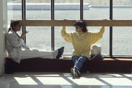 Photograph of two students having a conversation