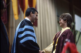 Photograph of President Robert Gordon and a student