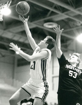 Photograph of Students Playing Basketball