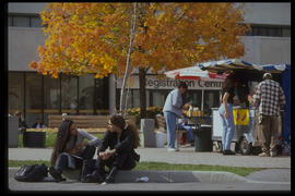 Photograph of students buying at a food cart
