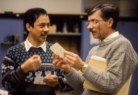 Photograph of a faculty member in discussion with a student