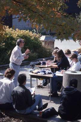 Photograph of a Professor Teaching Outside