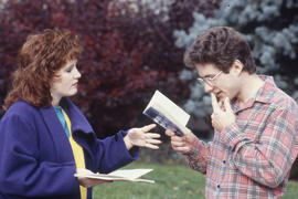 Photograph of Theatre students reading lines from a play