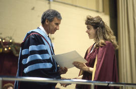 Photograph of a Student Receiving Her Certificate at Convocation