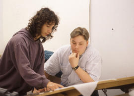 Photograph of two students in the Drafting lab