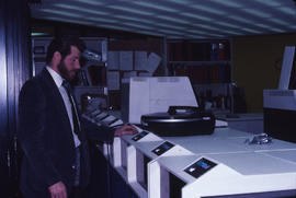 Photograph of computer operator Ed McDowell