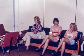 Photograph of Three Staff Members in the Lounge