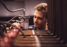 Photograph of a student in the Heating and Refrigeration lab