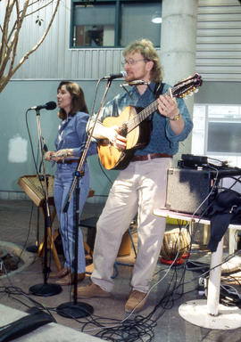Photograph of two musical performers performing