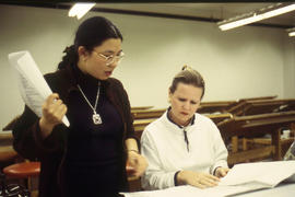 Photograph of faculty member from the Design Foundations programme working with student