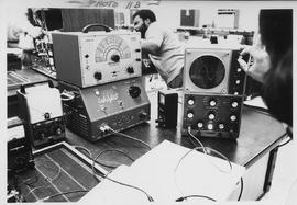 Photograph of a Student using an Oscilloscope