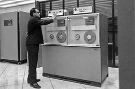 Photograph of Iqbal Mirza Checking on the IBM Tape Subsytem