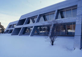 Photograph of snow covering the lawn in front of the technology building "N"