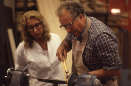 Photograph of an Instructor demonstrating at a wood lathe
