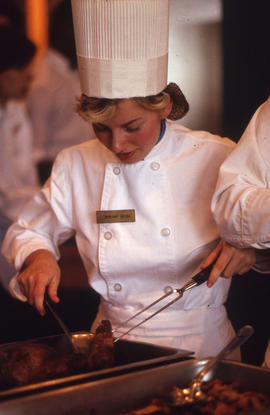 Photograph of a student chef at work