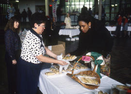 Photograph of Ellie Salamon at a staff bake sale