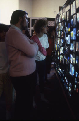 Photograph of students viewing a Creative Photography display