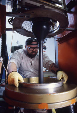 Photograph of a student using equipment at the Canadian Plastics Training Centre