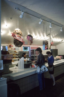 Photograph of visiting patrons to Swirls Frozen Yogurt and Ice-Cream