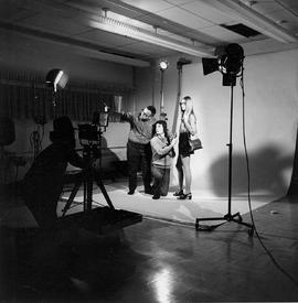 Photograph of Mike Gudz Working with Photograph Students on the Use of Lighting in a Lab
