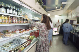 Photograph of Someone Selecting Food at the Kites Cafe