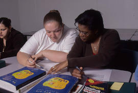 Photograph of students working on assignments