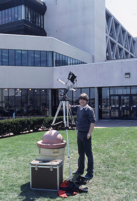 Photograph of a student setting up a large format 4x5 camera