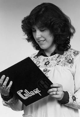 Photograph of Brenda Ballantyne Looking at a Collage