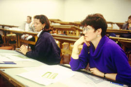 A photograph of students listening to a lecture in class
