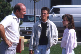 Photograph of an instructor and students