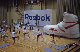 Photograph of a group of persons exercising