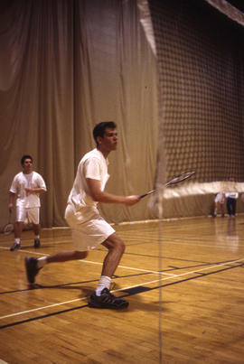 Photograph of badminton players in the gym