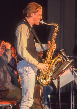 Photograph of a student musician playing tenor saxaphone