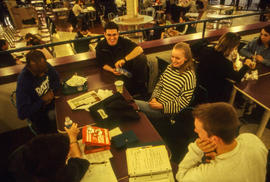 Photograph of Tracy Boyer and friends seated in the Pipe cafeteria