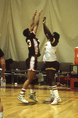 Photograph of Lady Hawks playing basketball against Seneca