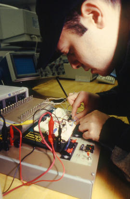 Photograph of a student in the Electronics program