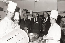 Photograph of student Chefs and guests in the Humber room kitchen
