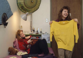 Photograph of students in a student residence room