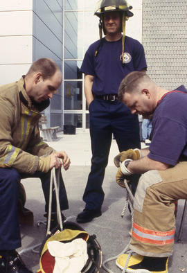 A photograph of Firefighting students tying ropes
