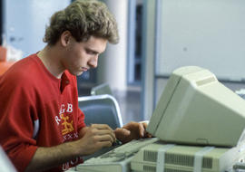 Photograph of a student working at a computer