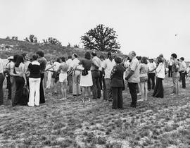 Photograph of Gordon Wragg Speaking with Faculty at a Staff Picnic
