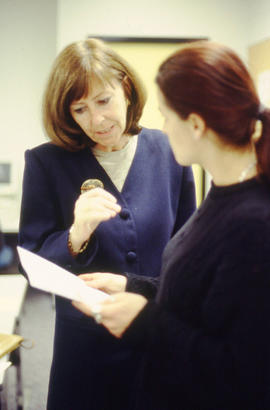 Photograph of Audrey Myers and a student