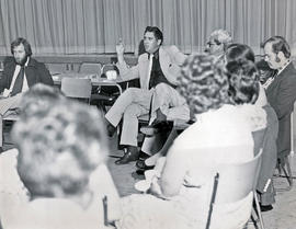 Photograph of Gus King Speaking at a Faculty Meeting