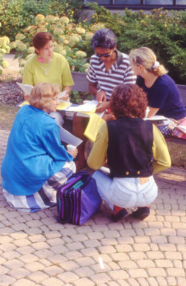 Photograph of students reviewing their homework together