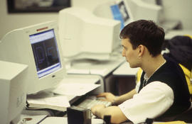Photograph of a student working on an assignment at the computer