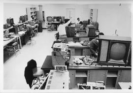 Photograph of Students Repairing Televisions in the Lab
